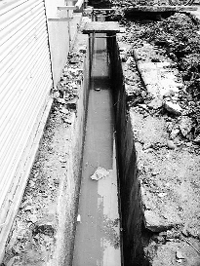 A drain left open by civic officials.