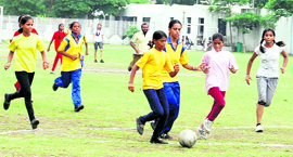 Players in action during a match of the Inter-Zonal District Football Tournament at BVM School, Kitchlu Nagar, Ludhiana, on Thursday.
