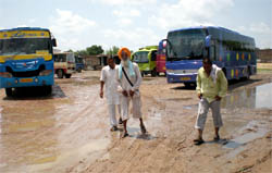 Commuters finding it difficult to walk at the Malout bus stand in Muktsar district