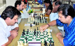 Players in action during the Chandigarh Chess Championship at St Xaviers School, Sector 44, Chandigarh, on Friday.