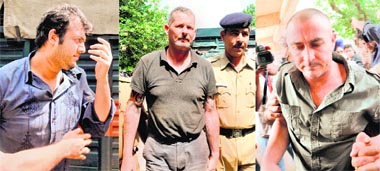 Gursher Singh (L), Simon Ginty (centre) and Grant Alan being taken for medical examination to the GMSH, Chandigarh, on Friday.