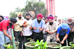 Doonites light candles in memory of schoolchildren who died in Sumgarh in Dehradun