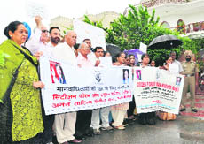 RTI activists take out a peace march in Chandigarh on Saturday. 