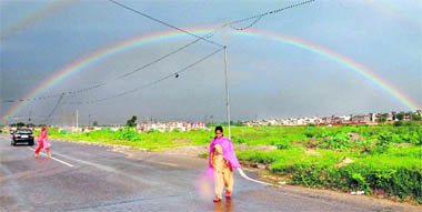 Rainbow appears on the horizon after rain in Chandigarh on Saturday evening. 