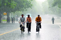 Cycle riders caught in the rains on Saturday