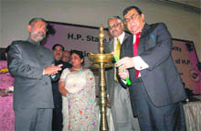 Justice Altamas Kabir (left), a Supreme Court judge, inaugurating the programme on mediation and training to referral judges and mediators, at Shimla on Saturday