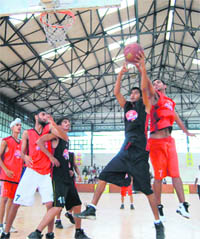 Players in action during the Mahindra NBA Basketball Challenge League in Ludhiana on Saturday.
