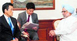 Prime Minister Manmohan Singh with Japanese Foreign Minister Katsuya Okada in New Delhi on Saturday.