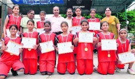 The Kendriya Vidyalaya, Roorkee, team pose after winning the basketball trophy at the Kendriya Vidyalaya Sports Meet-2010 in Dehradun on Sunday.