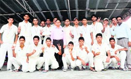 The cricket team of the KV, Meerut, shows victory sign after it won cricket final at the Kendriya Vidyalaya Sports Meet-2010 in Dehradun on Sunday.