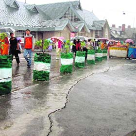 Heavy rain damages road at the Ridge in Shimla