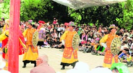 Tibetan opera performance outside the Norbulingka, the summer palace of the Dalai Lama.