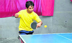 A player in action at the CBSE Sahodaya Inter-School Table Tennis Tournament in Dehradun on Monday. 