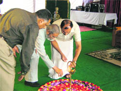 ITBP DIG Austin Eapen lights the ceremonial lamp on the ITBP premises in Mussoorie 