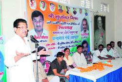 Suryakant Dhasmana, Congress leader, addresses a meeting at the Congress Bhawan in Dehradun on Monday. 