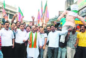 Activists of the BJYM hold a demonstration in protest against the alleged involvement of two politicians in the CET impersonation case in Jammu