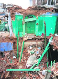 A view of the damaged house in the old city in Jammu
