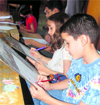 Children learn Kangra style of paintings at a school run in the local museum.