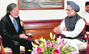 Prime Minister Manmohan Singh and Minister of Foreign Affairs of Afghanistan Zalmay Rassoul during a meeting in New Delhi on Tuesday.
