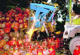 The mangled remains of an LPG-laden truck after an accident at Rajpura