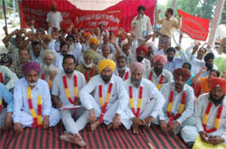 Members of the Class-IV Government Employees Union observing hunger strike in support of their demands outside the Mini-secretariat in Bathinda on Wednesday.