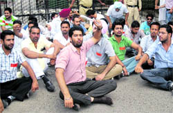 PUSU supporters protest outside the Panjab