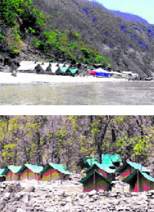 Two rafting camps on the banks of the river near Rishikesh