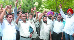 Punjab Roadways employees protest against the government in Jalandhar on Wednesday. 