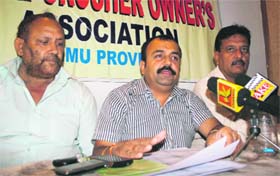 Vikram Randhawa (centre), president of the Stone Crushers Owners Association, addresses mediapersons in Jammu