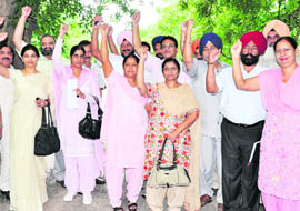 Principals protest in support of their demands at Panjab University, Chandigarh, on Thursday.