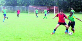 Players vie for the ball at the Inter-Section Soccer tournamnet at the RIMC in Dehradun on Thursday.
