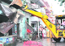 An encroachment being removed at Kankhal in Haridwar on Thursday.