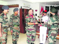 Lt-Gen BS Jaswal, GOC-in-C, Northern Command, presents the Flight Safety Trophy to Lt-Col SS Saini, Flight Commander, 2022 Utility Helicopters Flight. 