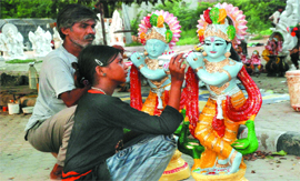 Creating the creator: With Janmashtami approaching, artists give the final touches to the idols of Lord Krishna in Bathinda