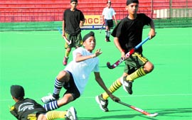Players in action during the SN Vohra Sub-Junior U-14 Hockey Tournament at the Sector 42 Hockey Stadium in Chandigarh on Friday.