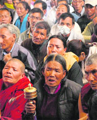 Members of the Ladakh Buddhist Association offer prayers a
