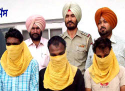 The alleged killers of Kanwal Parkash Chhabra (inset) in the custody of the Muktsar police on Saturday