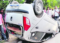 A Hyundai i10 car, reportedly driven by youngsters, overturned after it collided with a Honda City car on the road separating Industrial Area and Sector 29 in Chandigarh on Saturday.