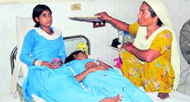 Ailing schoolgirls from Kalanwali at the Sirsa General Hospital on Saturday.