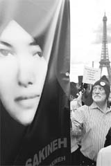 Protesters demonstrate against the death-by-stoning sentence awarded to Iranian woman Sakineh Mohammadi Ashtiani, at Trocadero, near Eiffel Tower, in Paris on Saturday.