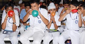 Students enjoying a game during a youth leadership camp organised by the Junior Chamber International at the LRS DAV Senior Secondary School in Abohar on Saturday.