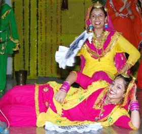 Students performing during a talent hunt function.