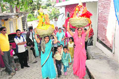 Women prepare for the Anthon festical in Pitthoragarh town. 