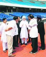 Prime Minister Manmohan Singh during his visit to the Jawaharlal Nehru Stadium in New Delhi on Sunday. 