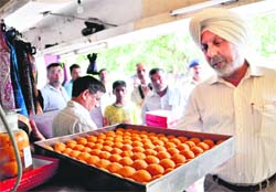 Chandigarh Additional Deputy Commissioner PS Shergill at Maa Durga Sweets Shop in Sector 34 during a raid by health officials in Chandigarh