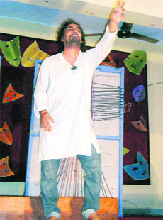 Stage artiste Rohit Kaushik in a doleful mood as he performs in the play "Ab . Tum Bhi Kaho Ardhya!" in Fatehabad on Sunday.