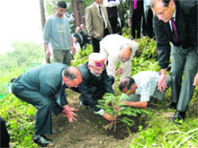 Chief Justice Kurian Joseph plants a sapling on the premises of the Himachal Pradesh High Court in Shimla on Monday.