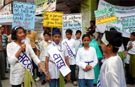 Students of the Millennium School stage a street play to raise awareness against the use of polythene bags in Bathinda on Tuesday