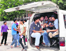 Students of UICET being taken to Fun City on Tuesday by a student organisation. 
