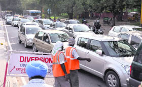 Traffic jam on the road separating Sectors 35 and 36 due re-carpeting in Chandigarh on Tuesday.